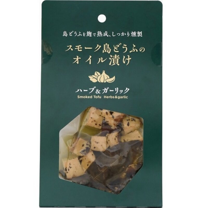 食物 Kakehashi 公司煙燻島豆腐醃製在油中香草和大蒜